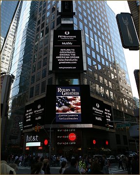 Illustrated by Igor Babailov Return to Greatness book, on the billboard at Times Square in New York City